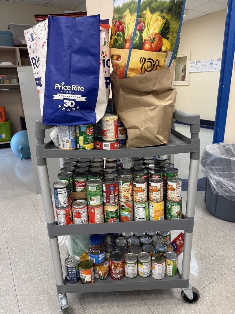 A gray three-tier rolling cart filled with canned food donations.