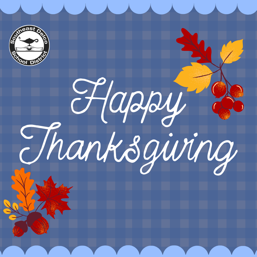 A blue checkered background with scalloped borders at the top and bottom. The Southeast Delco School District logo appears in the upper left corner. Decorative autumn leaves, berries, and acorns are placed in the upper right and lower left corners. Center text reads ‘Happy Thanksgiving’ in white script.