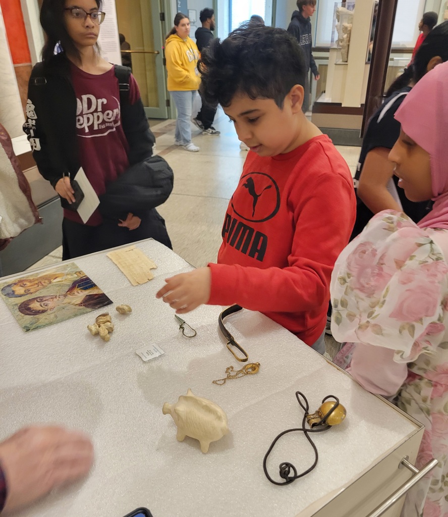Students looking at an exhibit