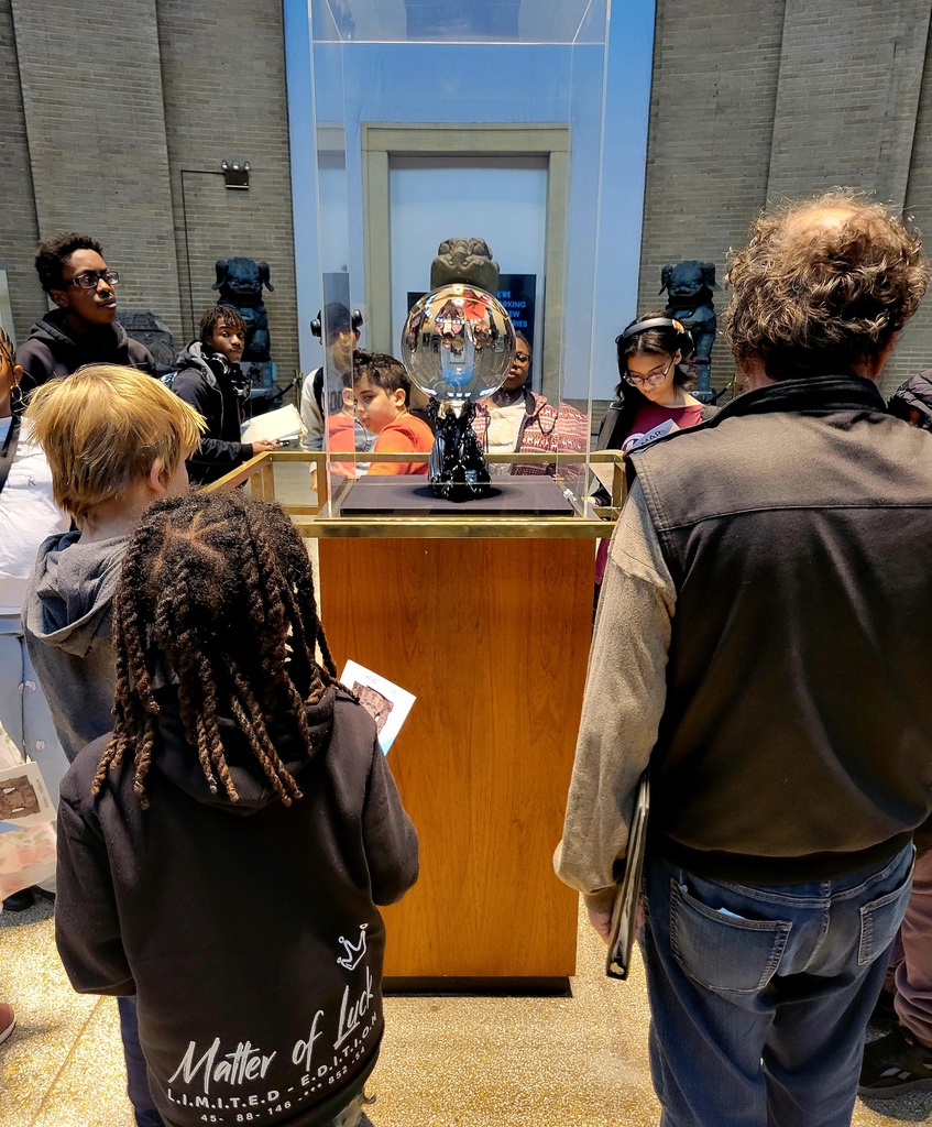 Students looking at an exhibit