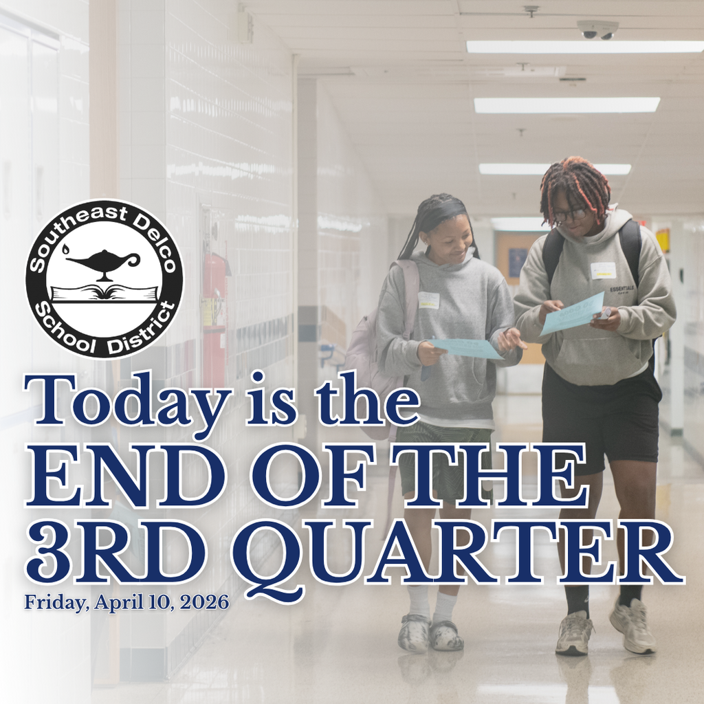 Two students walk down a school hallway reviewing papers as the Southeast Delco School District announces the end of the 3rd quarter on April 10, 2026.