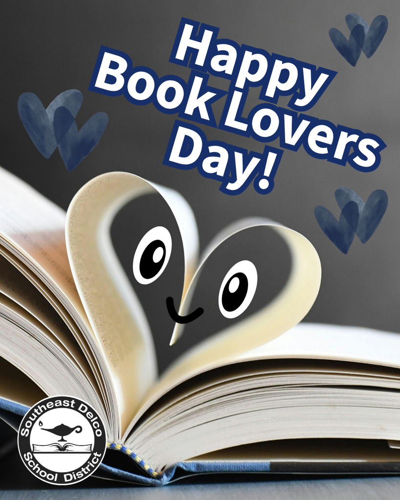Open book pages folded into a heart shape with smiling eyes, celebrating Happy Book Lovers Day against a dark background.