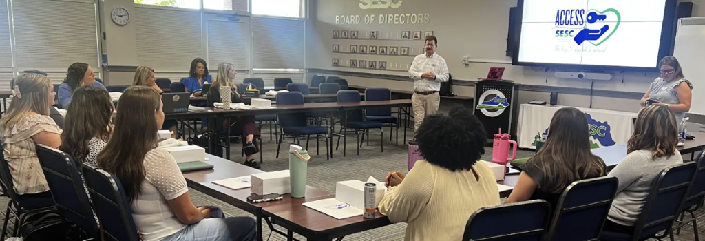 Graduate students being oriented to the school based mental health process