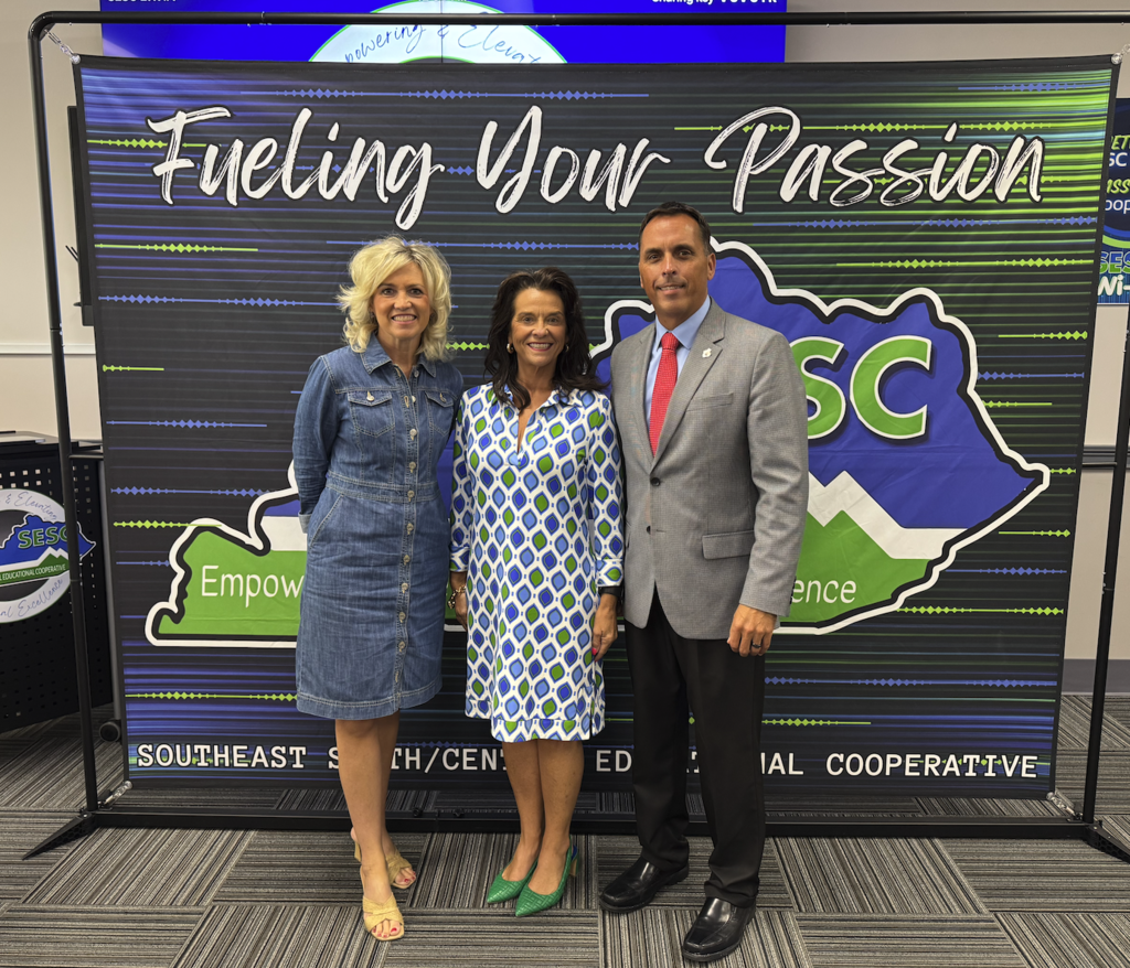 Chairman Carrie Ballinger, Executive Director Kay Dixon, and Vice-Chairman Barry Lee