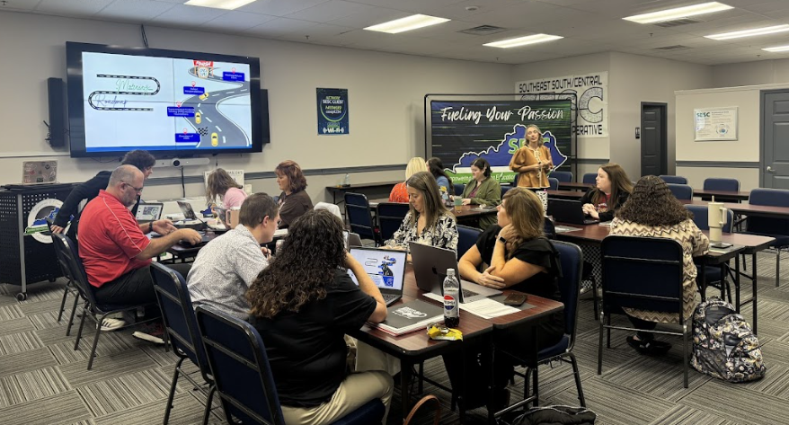 Image of adults receiving instruction on Data based decision making
