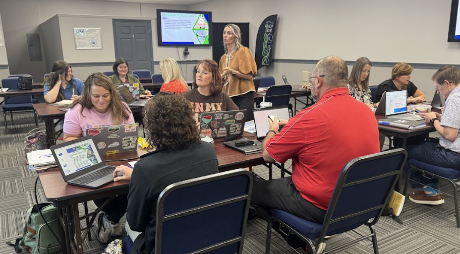 Image of adults receiving instruction on Data based decision making
