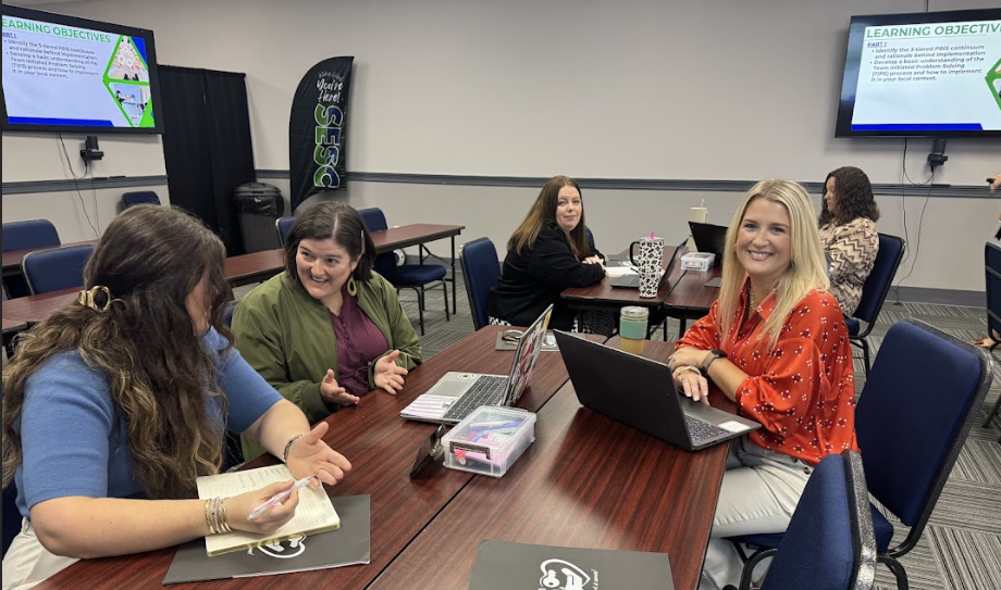 Image of adults receiving instruction on Data based decision making