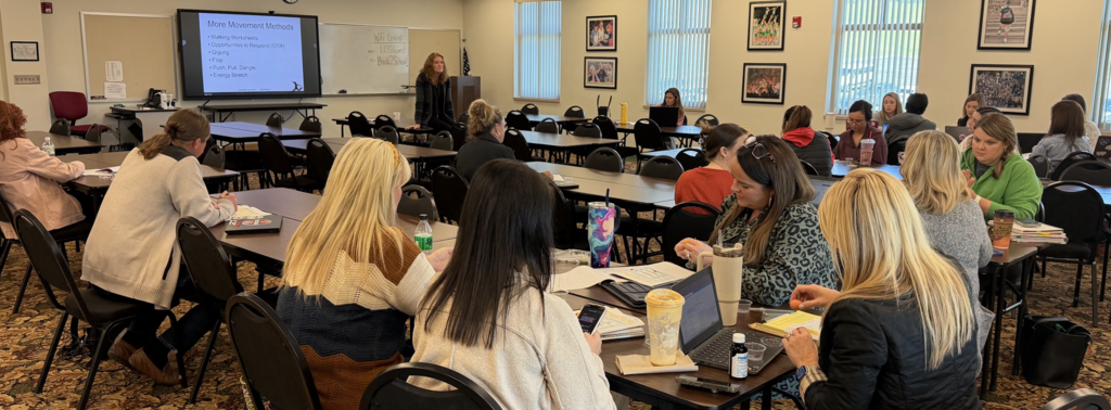 Teachers participating in a training