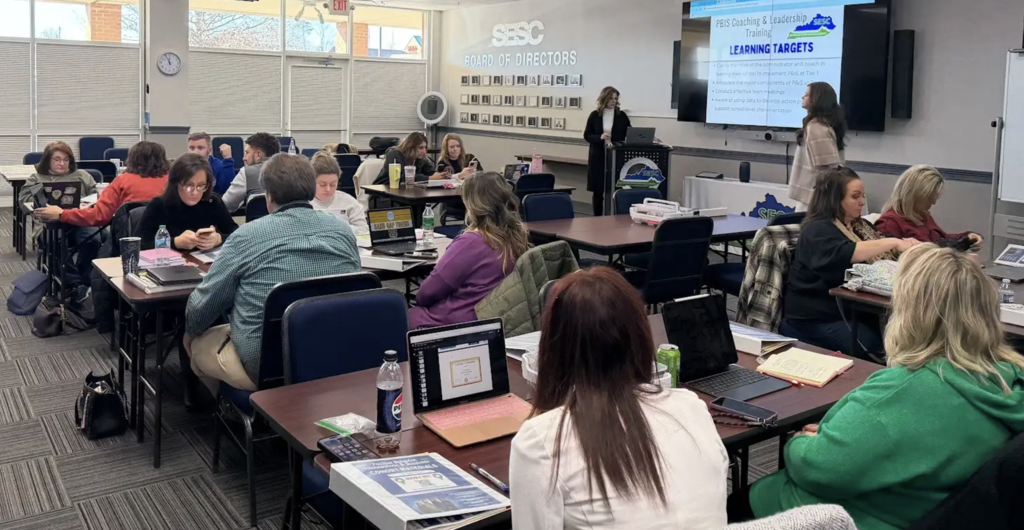 School and district coaches participating in a training session at SESC