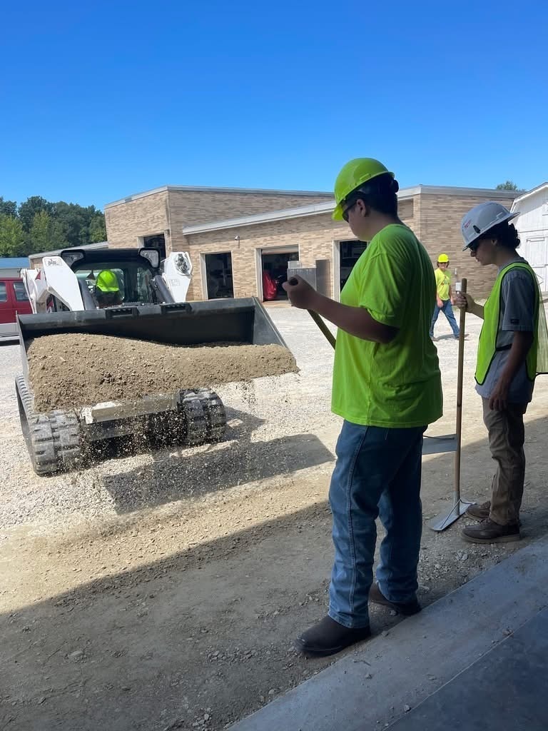 boys working on gravel