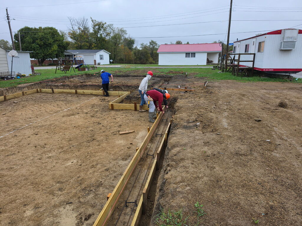 Building Trades II Class working on footers for the new project house.