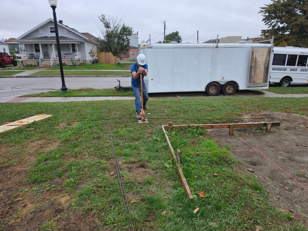 Building Trades II Class working on footers for the new project house.
