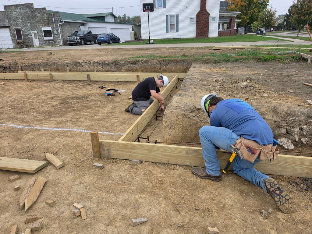 Building Trades II Class working on footers for the new project house.