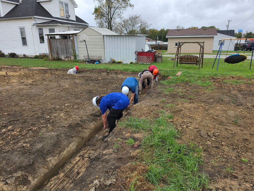 Building Trades II Class working on footers for the new project house.