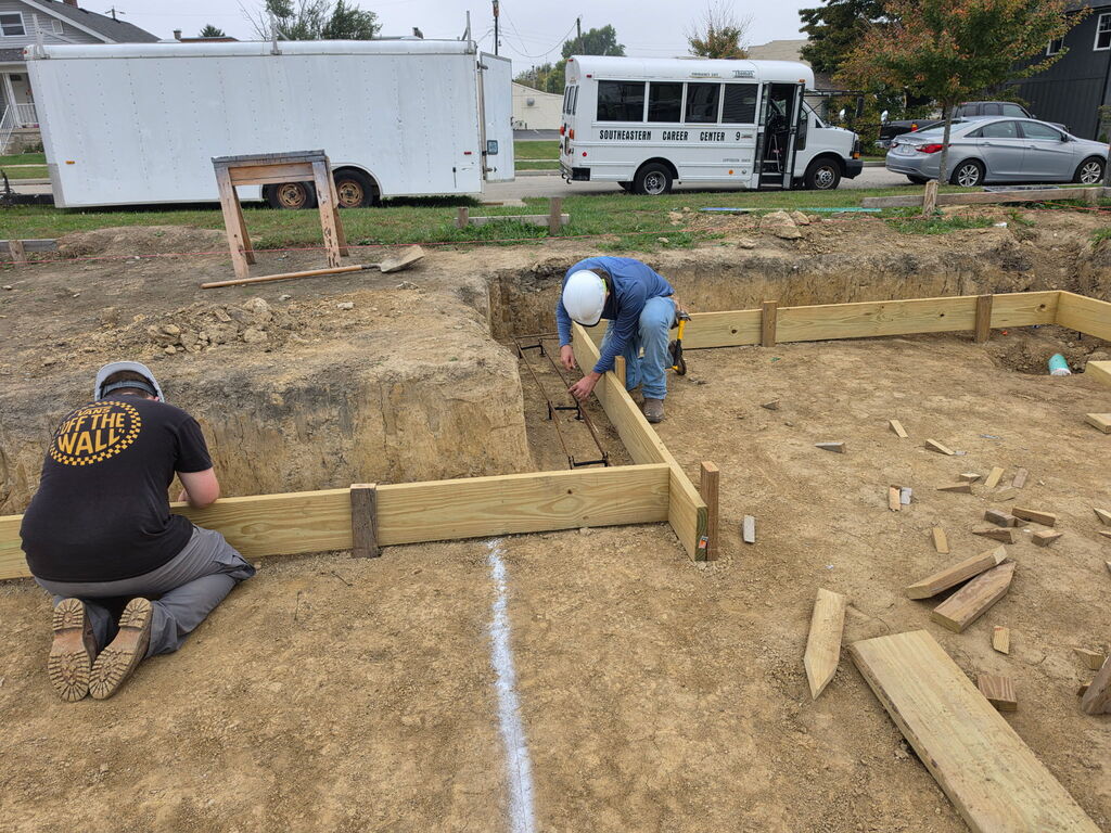 Building Trades II Class working on footers for the new project house.