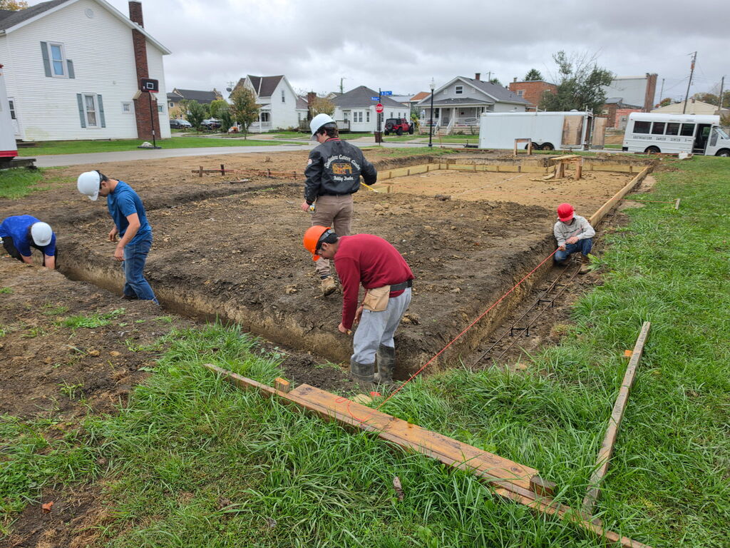 Building Trades II Class working on footers for the new project house.