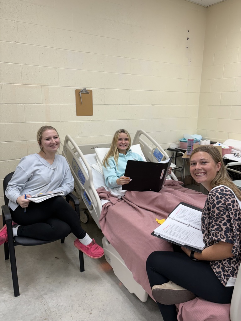Health Science II students are practicing essential patient-care skills by learning how to safely transfer patients from gurneys and wheelchairs to beds.