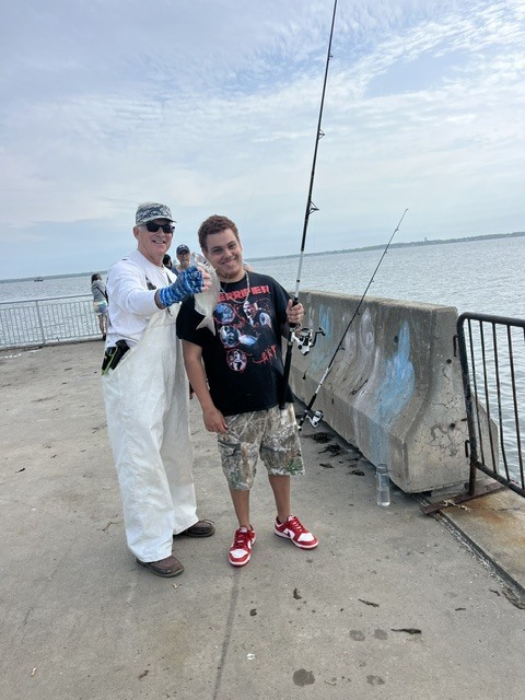 Captain caught a fish with the student