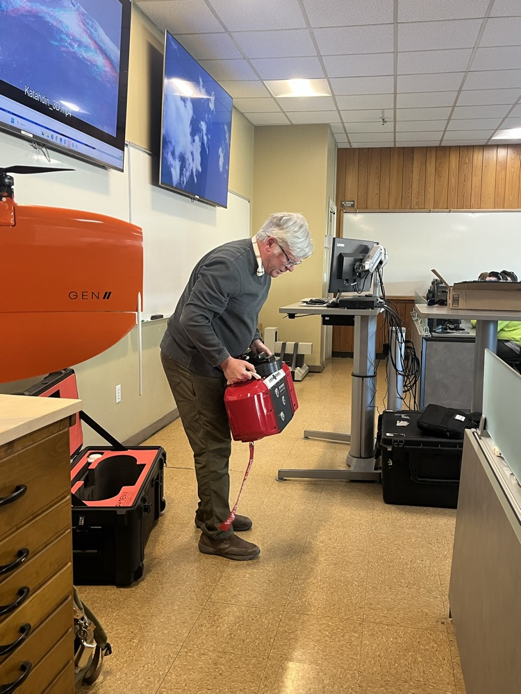 this piece of equipment attaches to the underside of the UMaine plane and takes infrared photographs