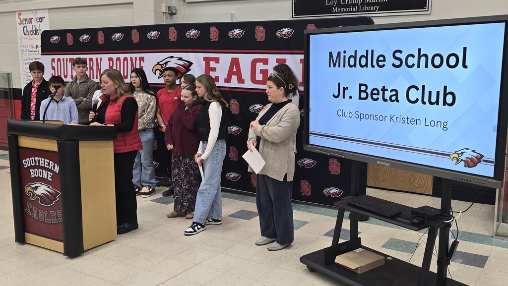 Middle School Jr. Beta Club students giving an update at the Golden Eagles Club Dinner and Program