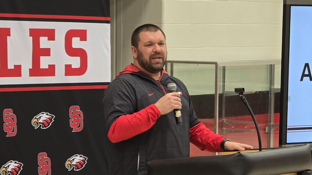 Activities Director Trent Tracy giving an update at the Golden Eagles Club Dinner and Program.
