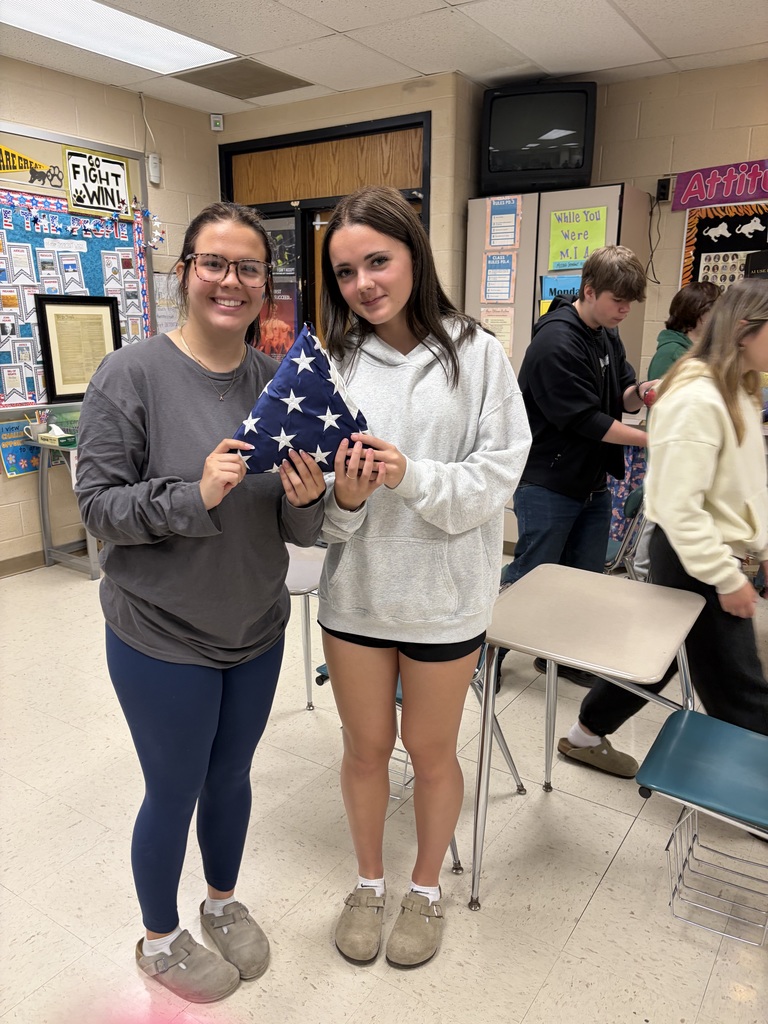 Students in Miss Hoffman’s Civics & American Government classes practiced proper flag folding and etiquette yesterday, gaining hands-on experience in demonstrating respect and understanding of national traditions.