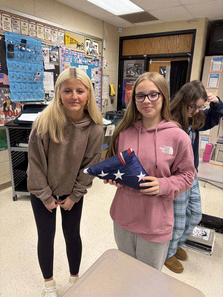 Students in Miss Hoffman’s Civics & American Government classes practiced proper flag folding and etiquette yesterday, gaining hands-on experience in demonstrating respect and understanding of national traditions.
