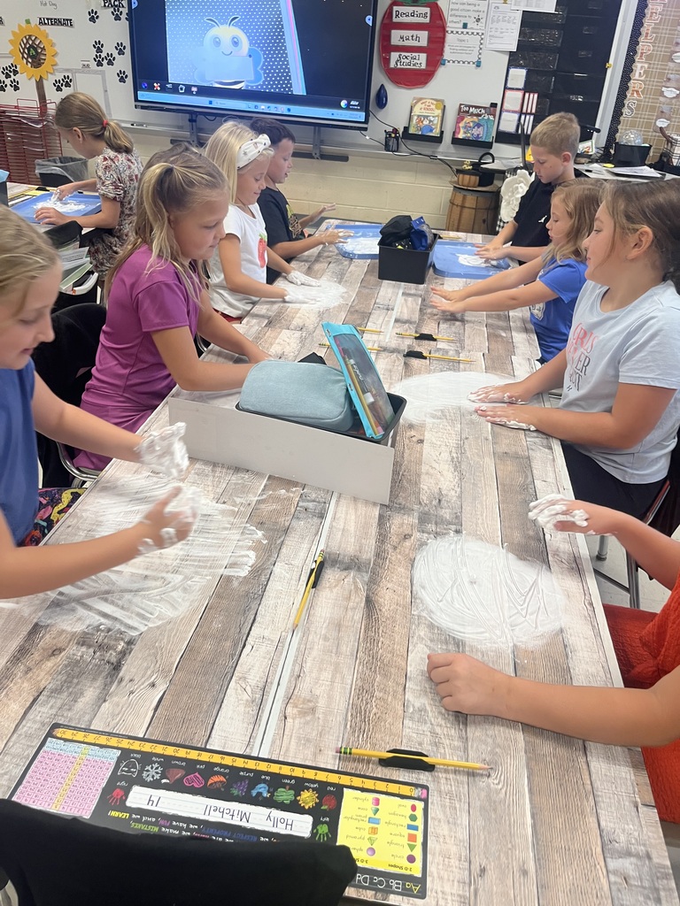 photo of math activity utilizing shaving cream