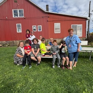 students visiting the red deer farm