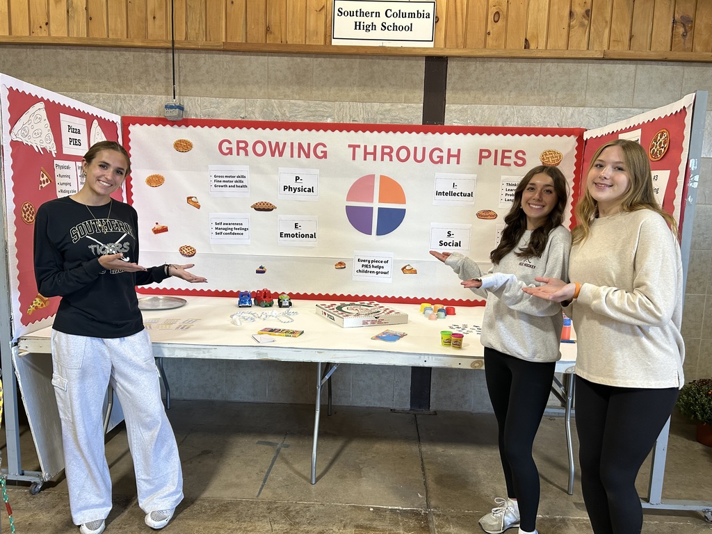 students setting up stands at bloomsburg fair