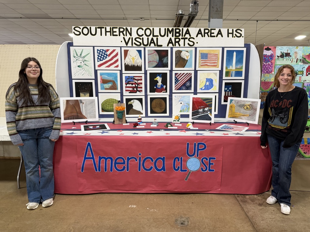 students setting up stands at bloomsburg fair