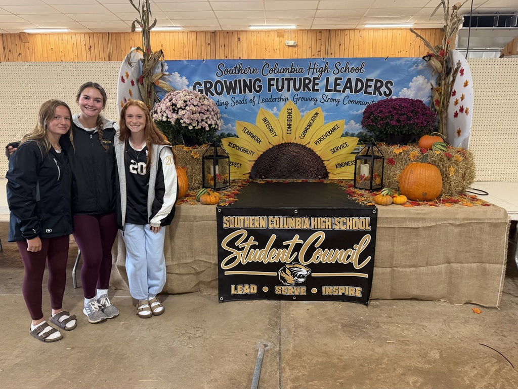 students setting up stands at bloomsburg fair