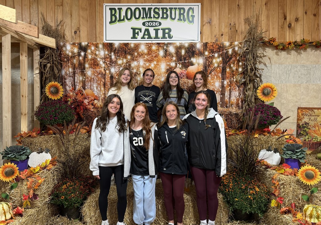 students setting up stands at bloomsburg fair