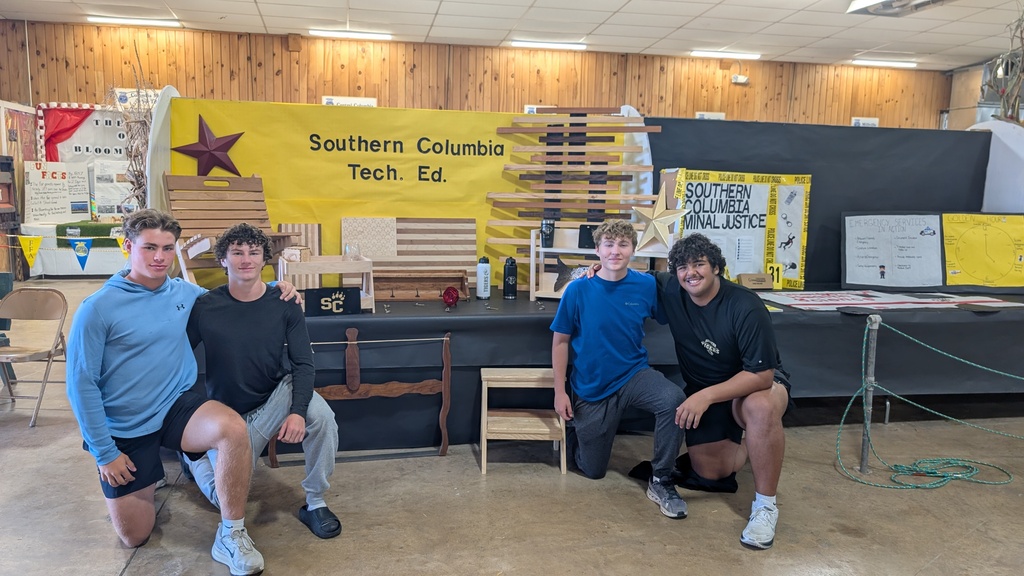 students setting up stands at bloomsburg fair