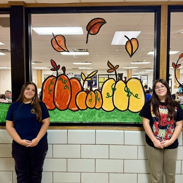 photo of art students who painted autumn designs