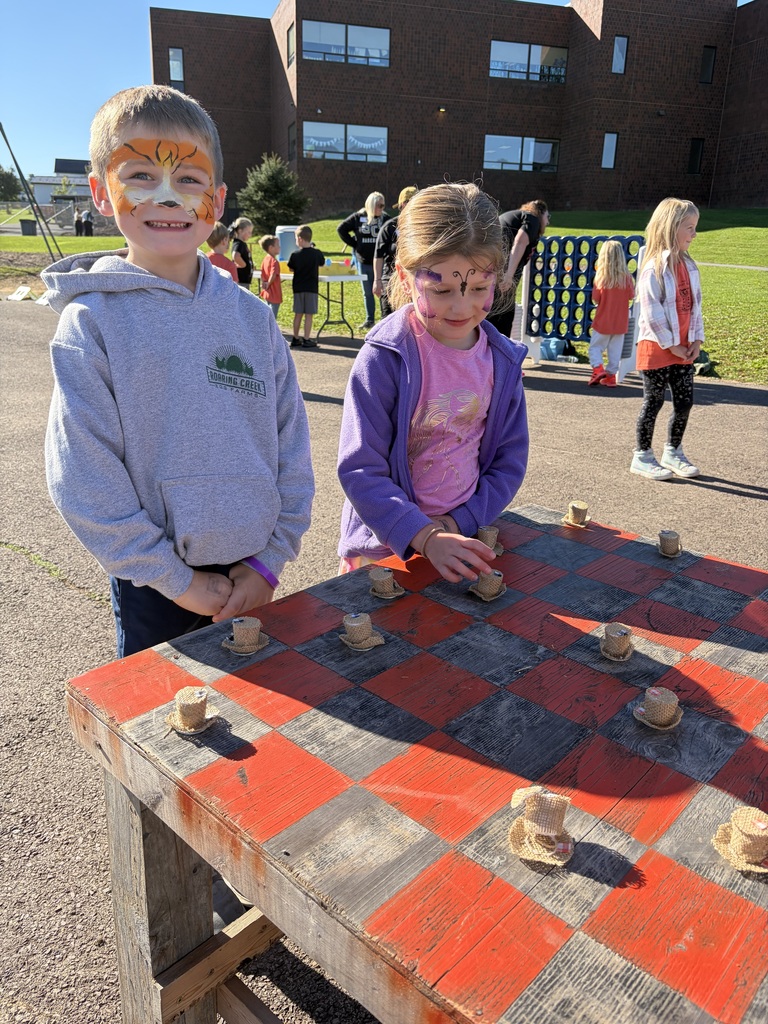 fall festival photo with elementary students