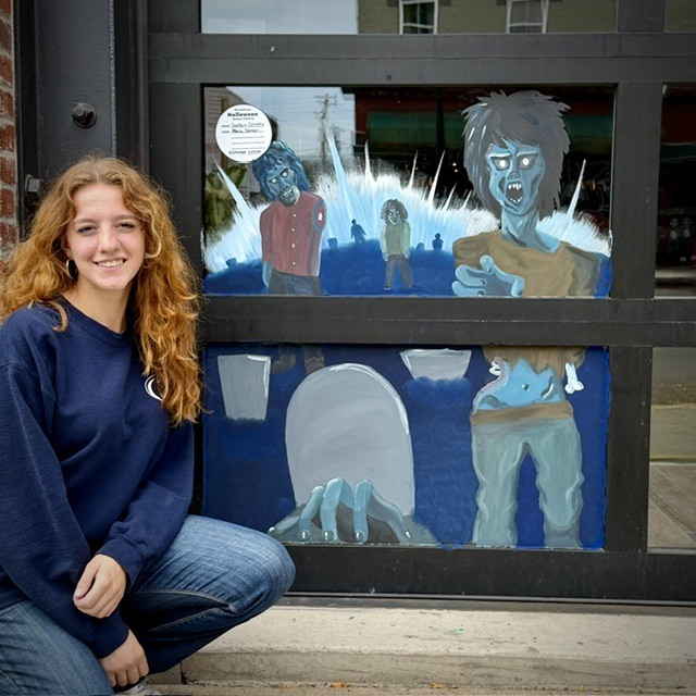 halloween window painting with artists