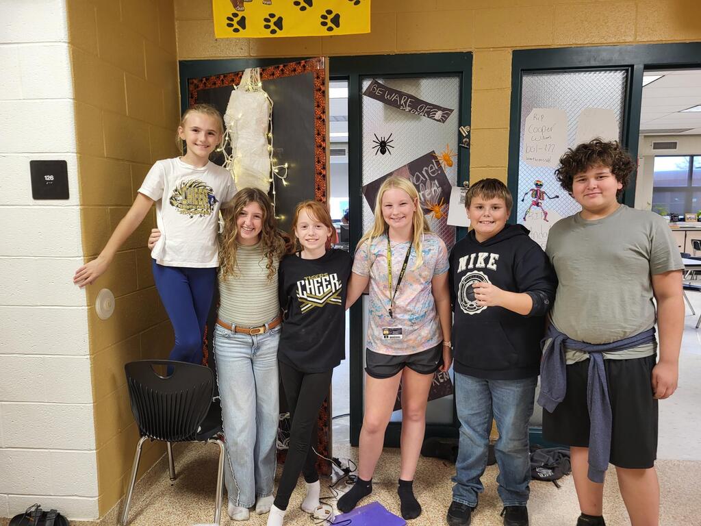 photo of students decorating for halloween