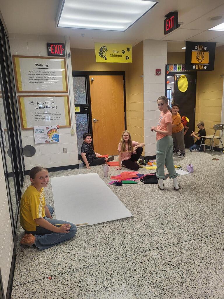 photo of students decorating for halloween