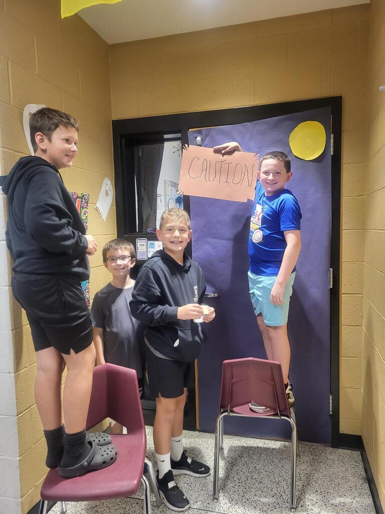 photo of students decorating for halloween