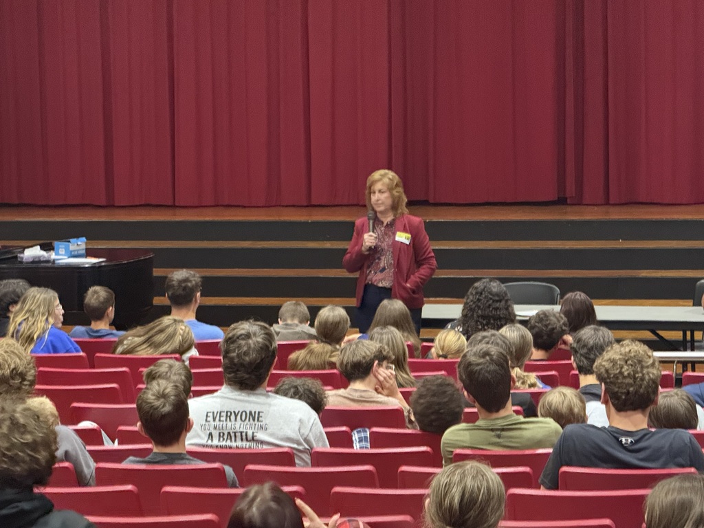 senator speaking to students