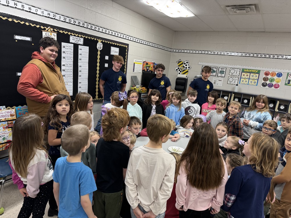 Pictured are the FFA officers explaining to the 1st graders the importance of why we need to wash our hands properly.
