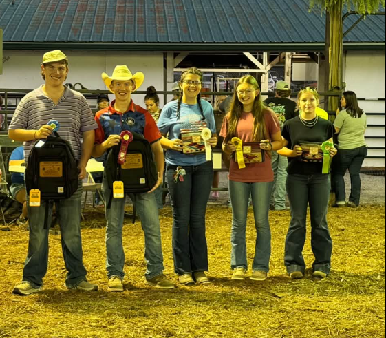 Top 5 in the senior division of the livestock judging contest from left to right: 1st place: Jack Burke 2nd place: Davion Moran  3rd place: Hannah Jackson  4th place: Lakin Ridenour  5th place: Taylor Cook 