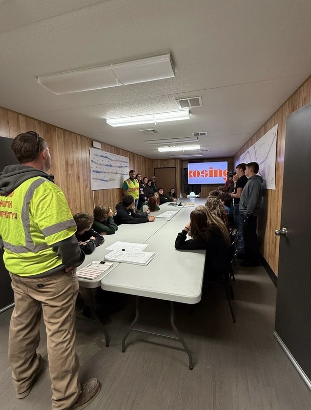 The students listen to the instructors while they talk about their duties and responsibilities.