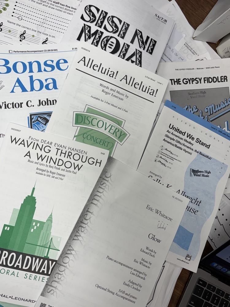 a pile of choral octavos