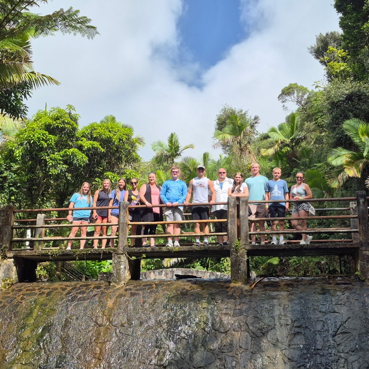 pic of kids at Baño Grande in El Yunque