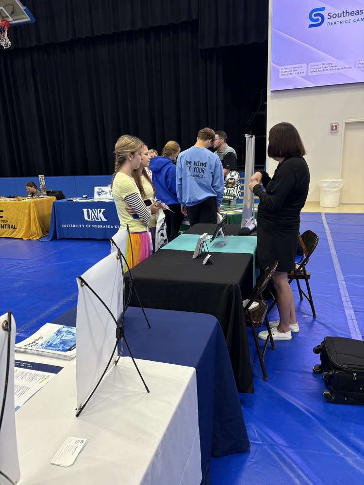 students visiting with college rep