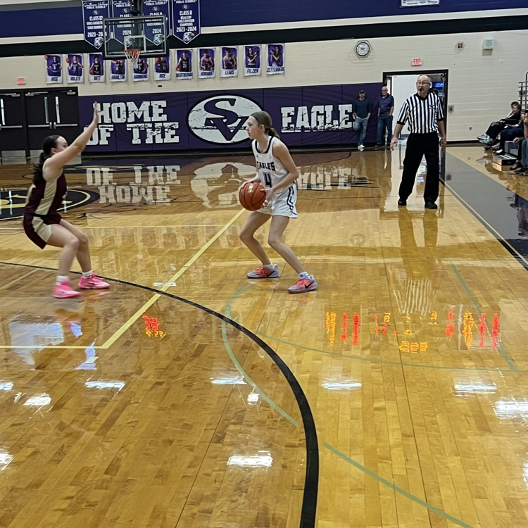 Haisley with the ball on the wing looking for a cutting teammate