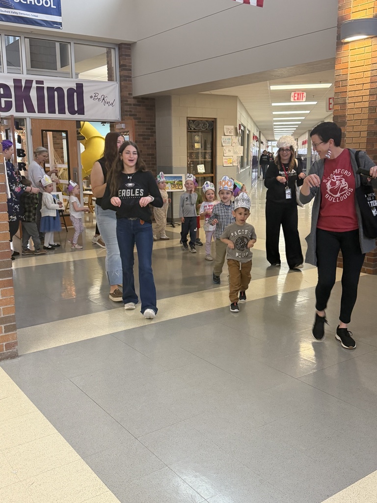 Miss Amy with preschool and NHS helpers