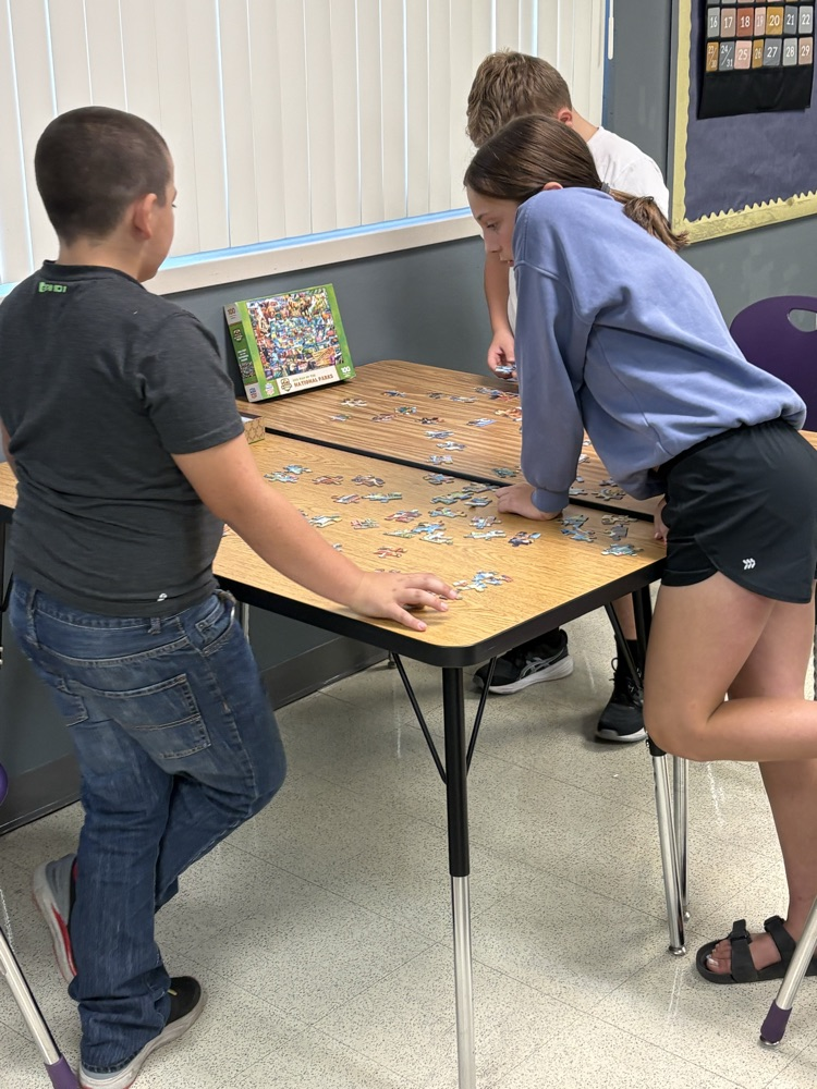 5th grade trying to solve their puzzle!